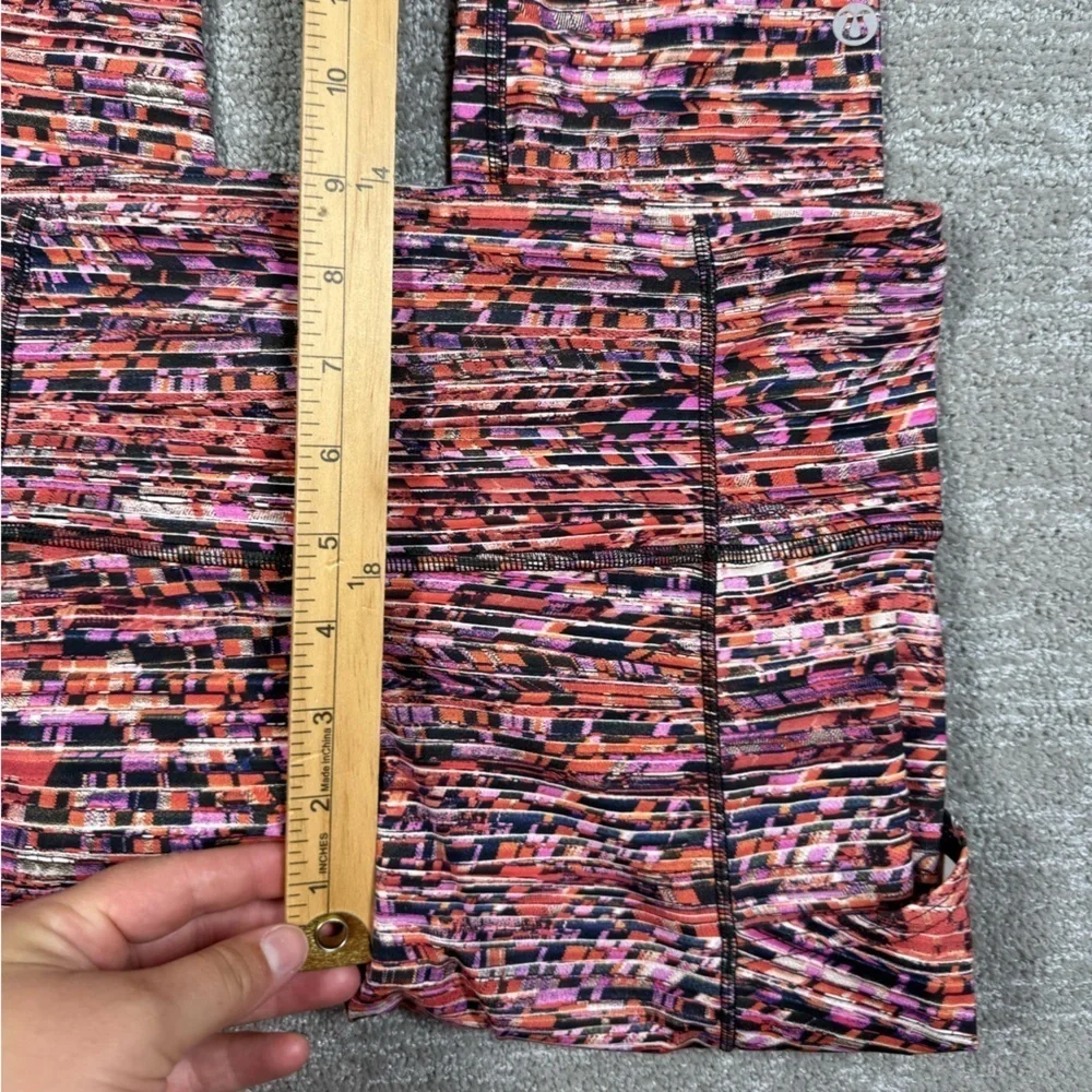 Lululemon Fast and Free Tight II Nulux Flash Pleat Orange Multi Sz 6